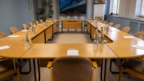 meeting room with tables and chairs
